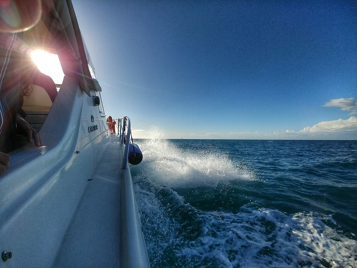 Speedboat traveling between Galapagos islands