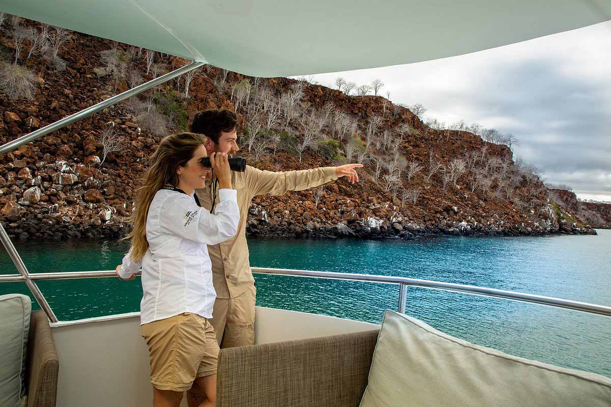 Couple exploring from a Galapagos cruise